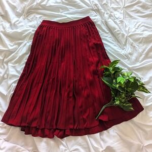 Pleated A-line red skirt